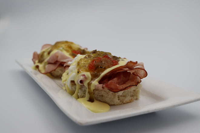 Eggs Benedict with Green Chili Jam, don't serivng just any eggs benedict, add a kick with our green chili pepper jam